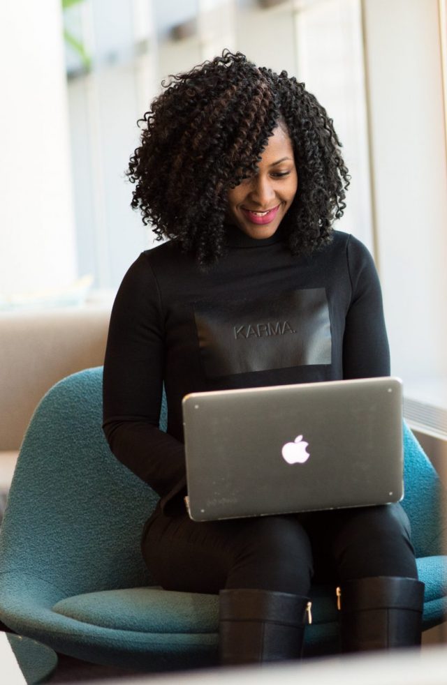 A young woman looks up accent training options