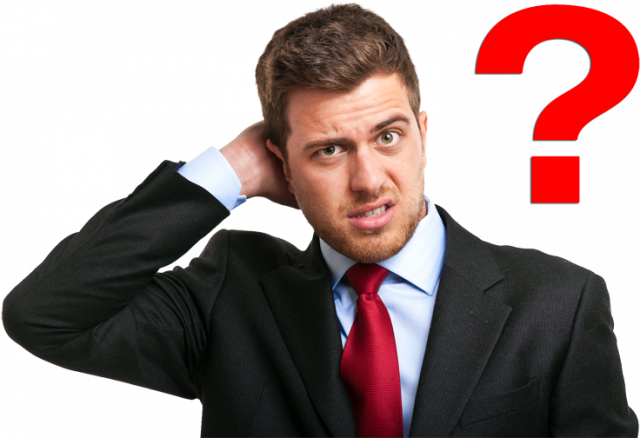 A man scratches his head in confusion.