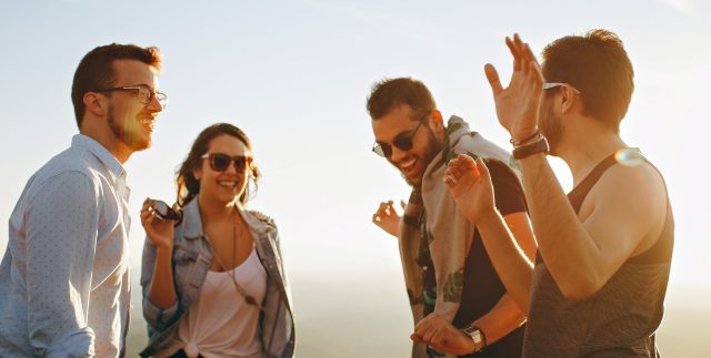 A group of friends converse naturally