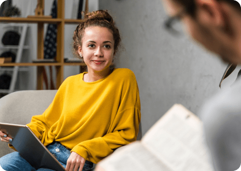 A woman sitting on a couch