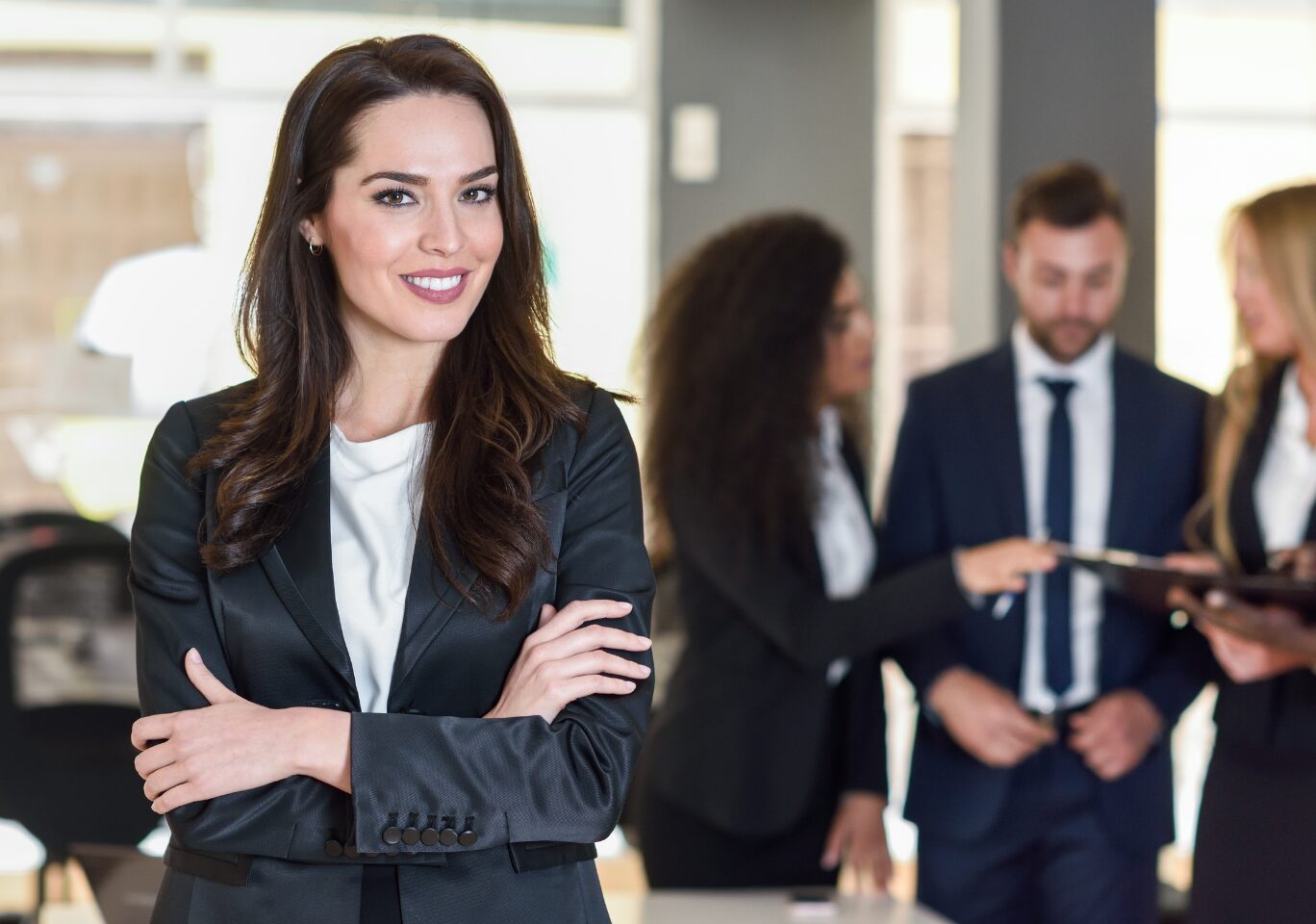 A business woman faces communication challenges in her workplace.