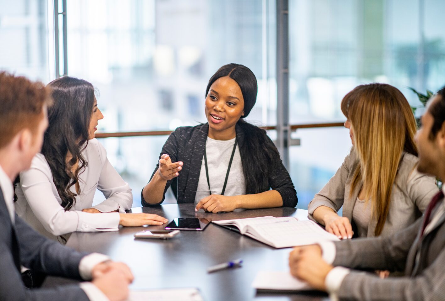 People sitting around the table in a business meeting